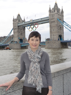 Caroline Pidgeon at Tower Bridge with Olympic Rings